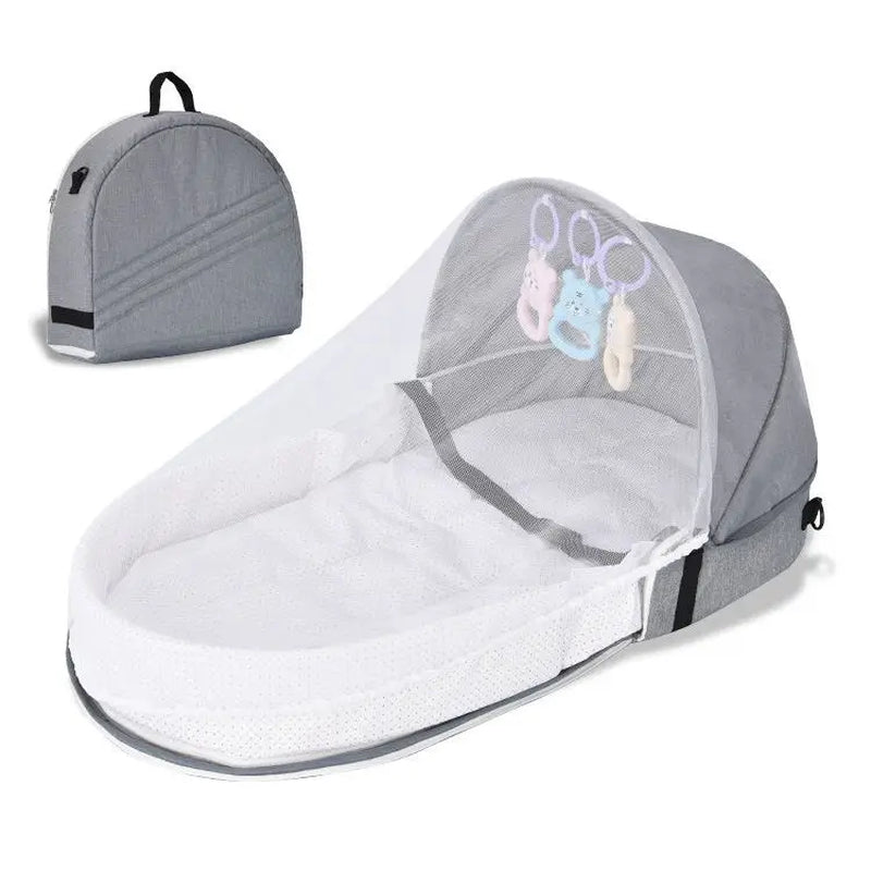 "Portable Baby Isolation Bionic Travel Crib - Convenient Folding Anti-Stress Bed"