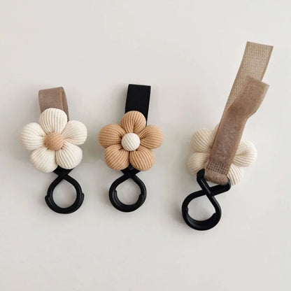 "Sweet Flower Baby Stroller Hook - Convenient Storage Solution for Infant Supplies"