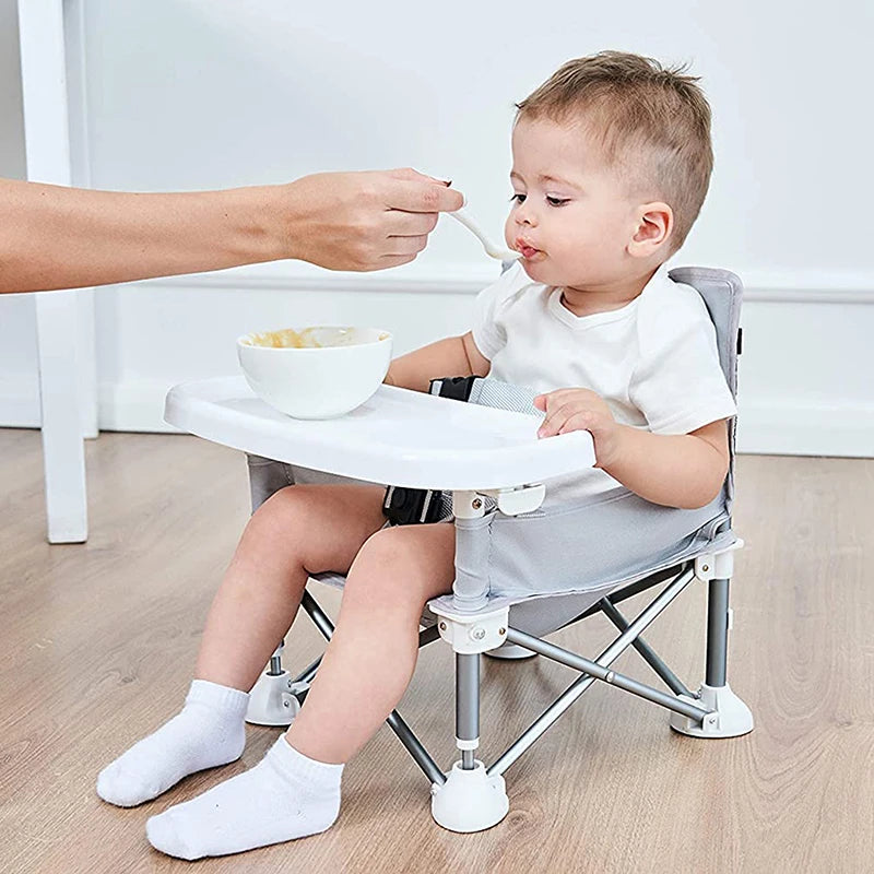 "Foldable Baby Dining Chair with Seat Belt and Plate - Portable and Comfortable Feeding Seat for Children"